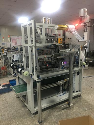 全自動(dòng)PE袋成型穿繩機(jī)